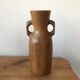 Olive wood flower vase.