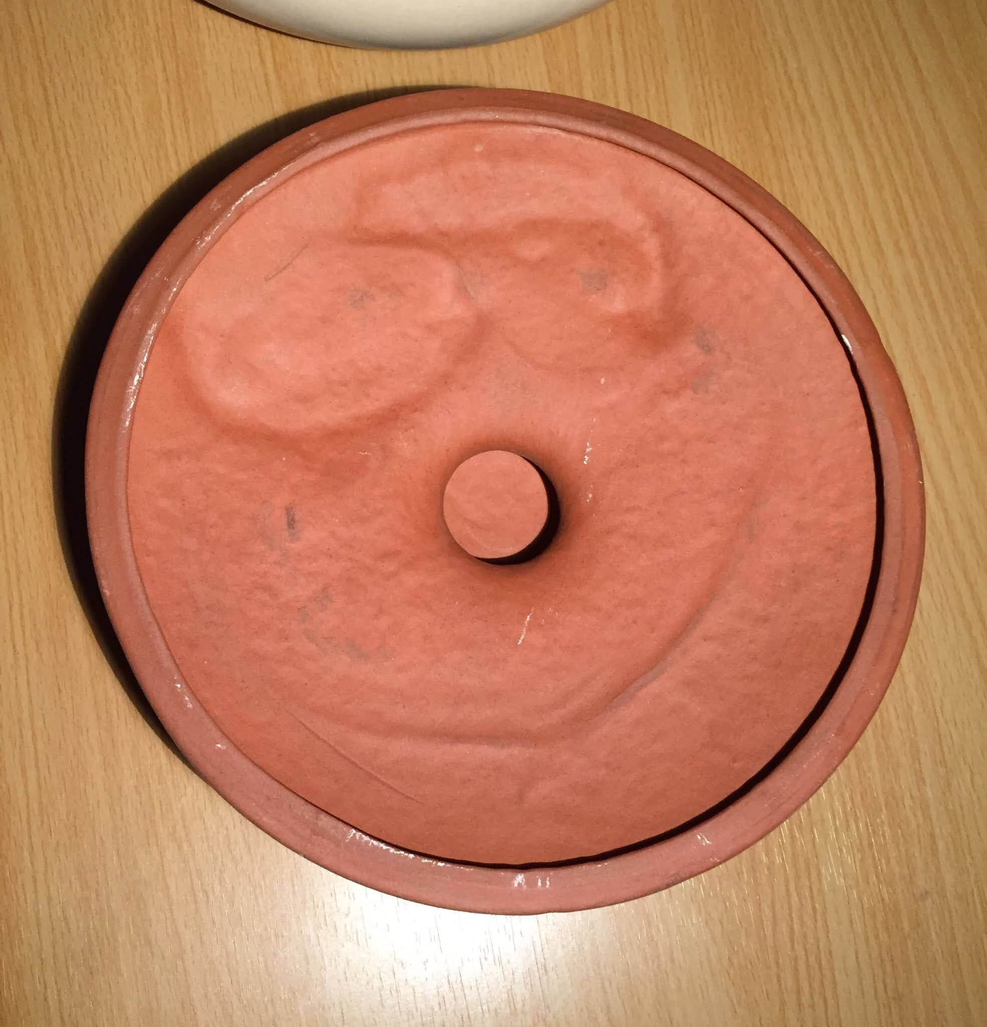 Bouillabaisse dish in terracotta fish decoration