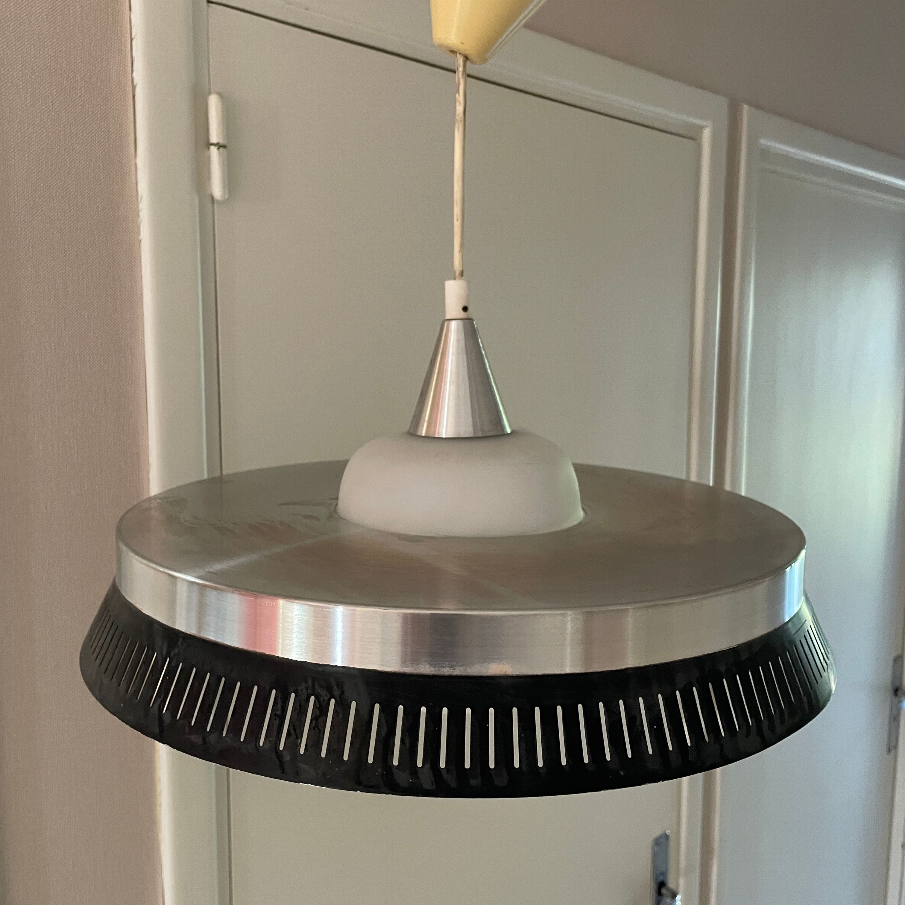 Scandinavian Fog & Murop pendant lamp in glass and perforated metal