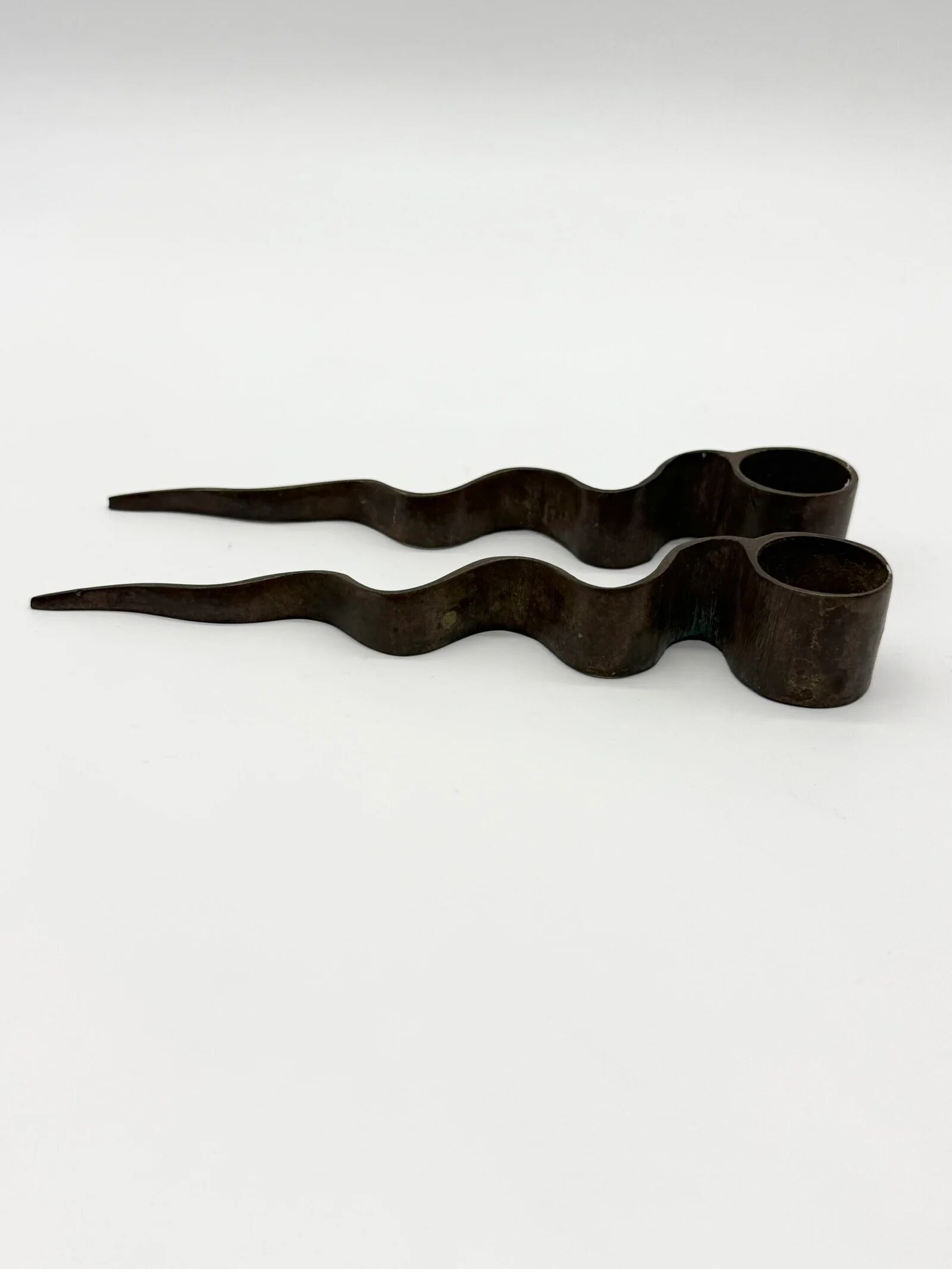 Pair of "Serpentine" candlesticks, modernist, 1970s