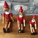 Trio of old wooden Pinocchio Made in Italy