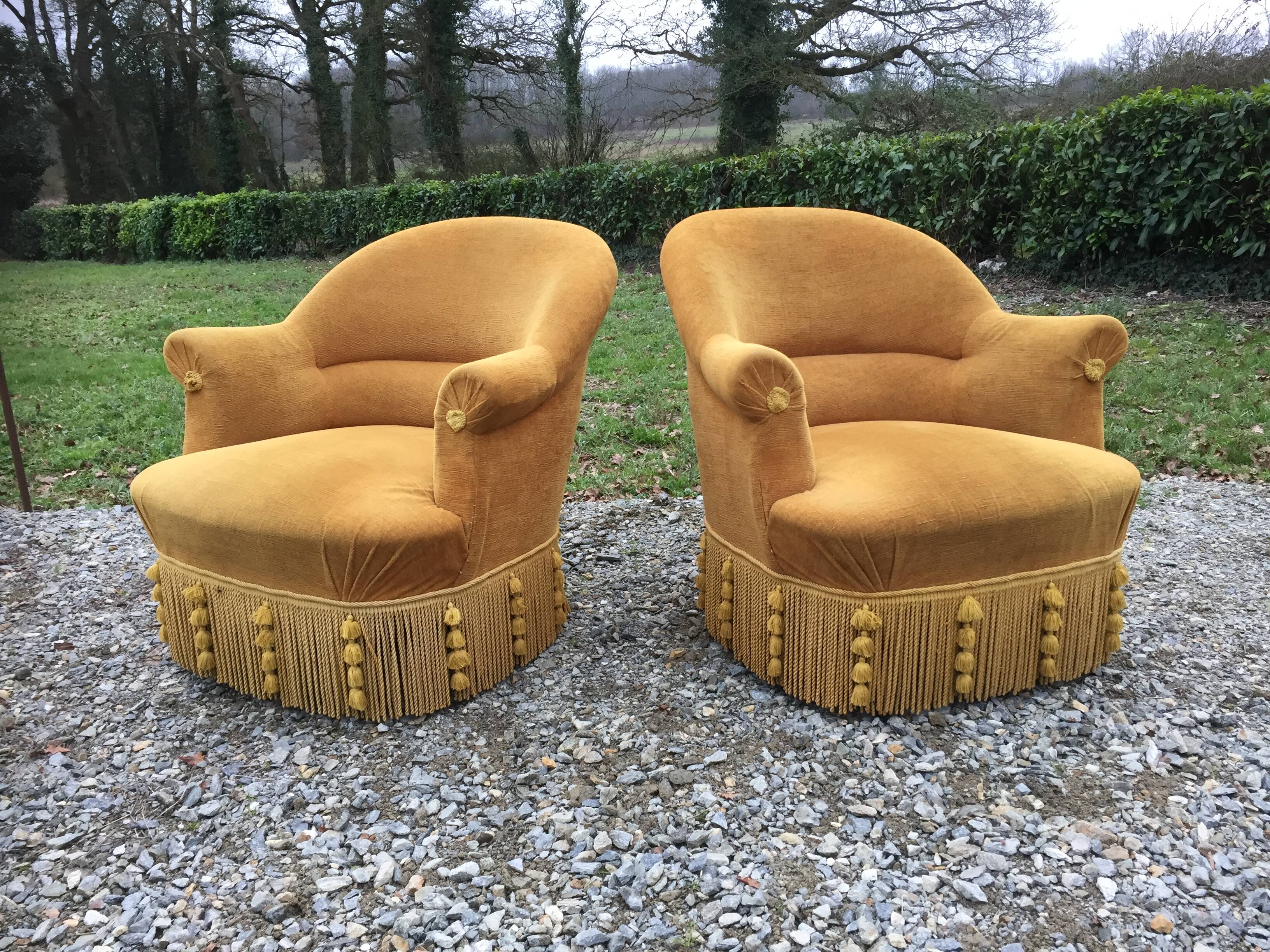 Duo de fauteuils vintage crapaud en tissu or