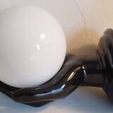 Hand-shaped wall light