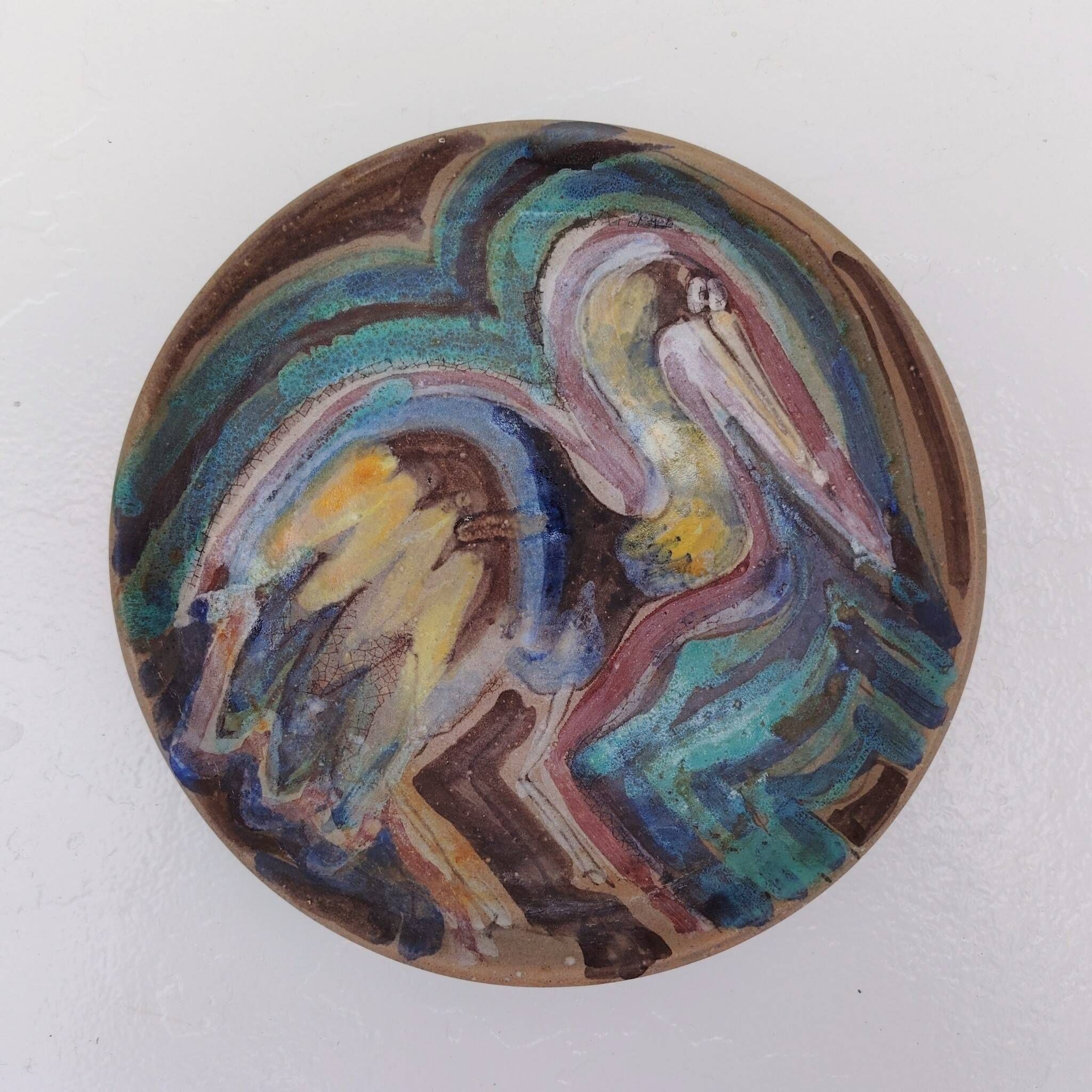 Assiette en céramique à l’oiseau vintage, signée