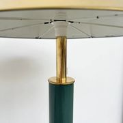 Lacquered metal floor lamp in green with a golden shade — Coolie shape — 1970s-80s