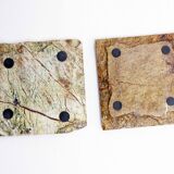 Pair of brutalist travertine candle holders