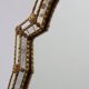 Large 20th century Venetian style trapezoidal brass and mosaic mirror
