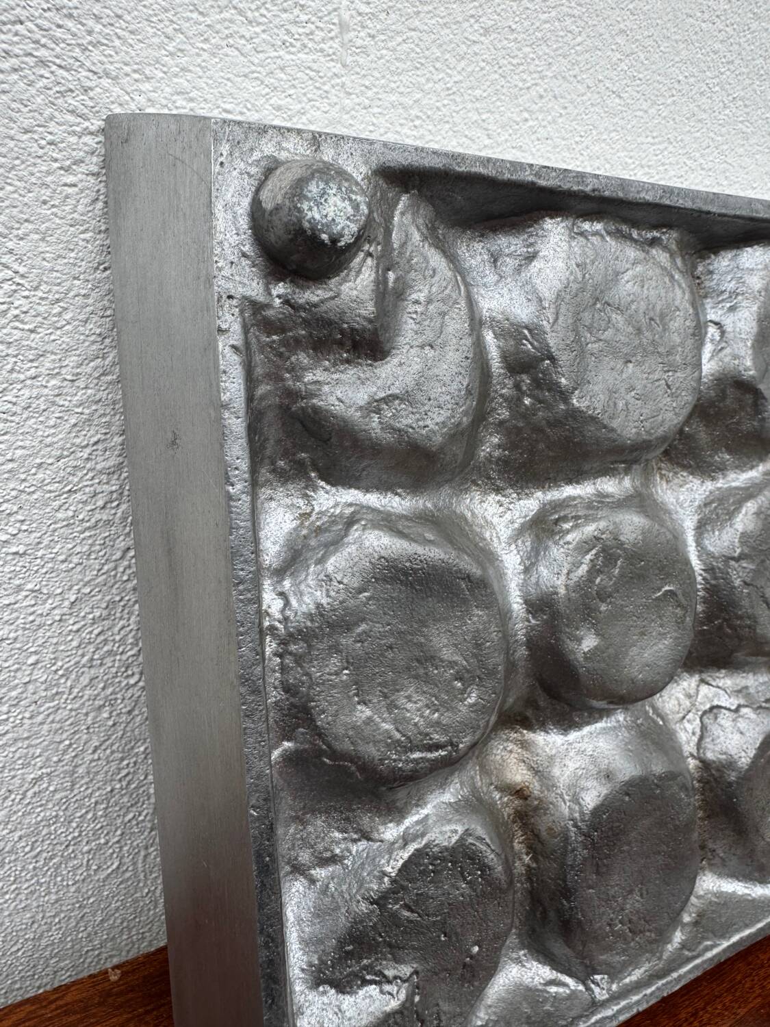 Brutalist style brushed aluminum candle holder