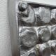 Brutalist style brushed aluminum candle holder