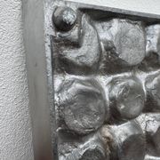 Brutalist style brushed aluminum candle holder