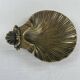 Shell-shaped catch-all tray
