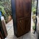 Armoire parisienne noire vitrée rénovée