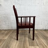 Varnished mahogany armchair with imitation leather seat, 70s