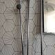Vintage aluminum wall coat rack.