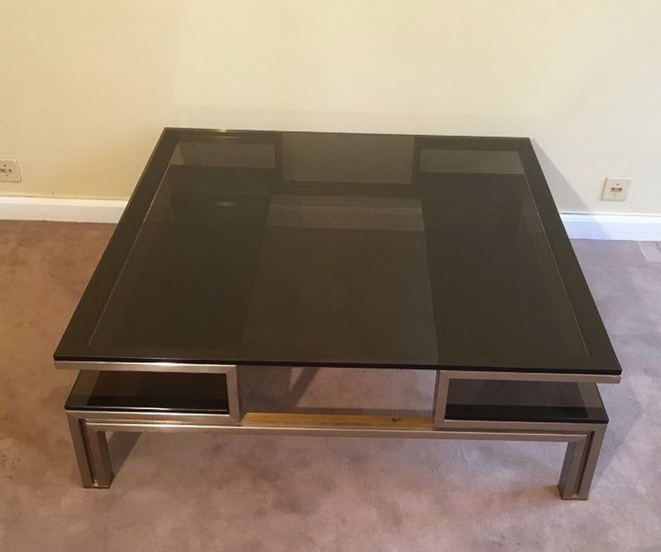 Very nice coffee table in brushed steel and brass