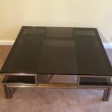 Très belle table basse en acier brossé et laiton