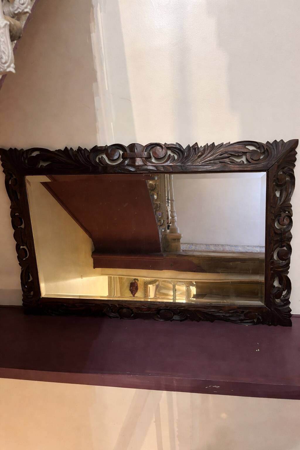 Antique mirror in carved wood