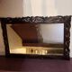 Antique mirror in carved wood