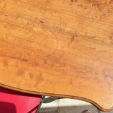 Solid wood table with curved legs