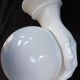 Giant hand-applied white ceramic Art Deco lamp.