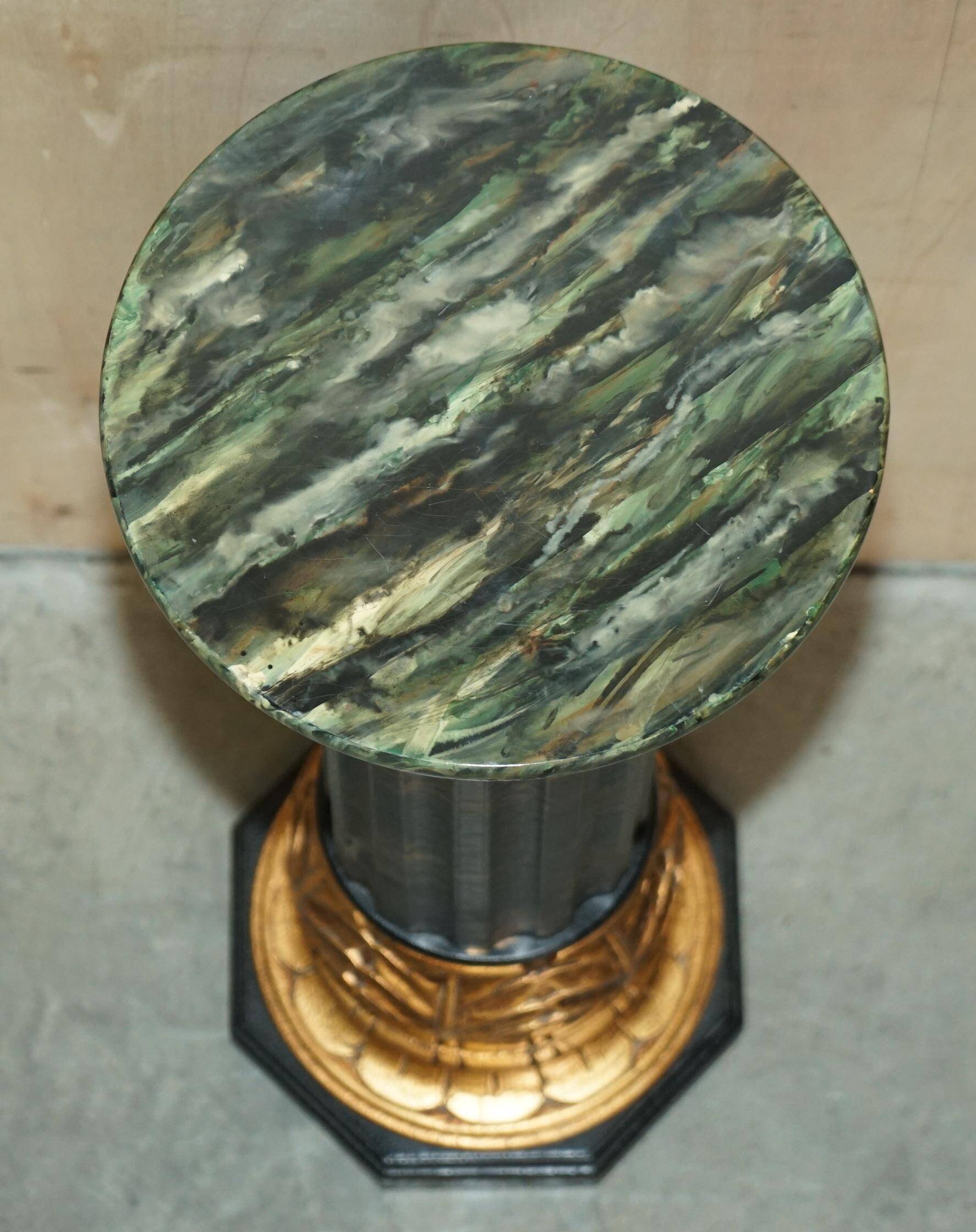 Pair of lacquered torchère columns in Chinoiserie neoclassical style.