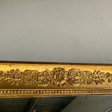 Golden mirror style Restoration decorated with stretched palmettes