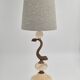 Sculptural table lamp in alabaster with fish/dolphin decoration, Swedish Grace