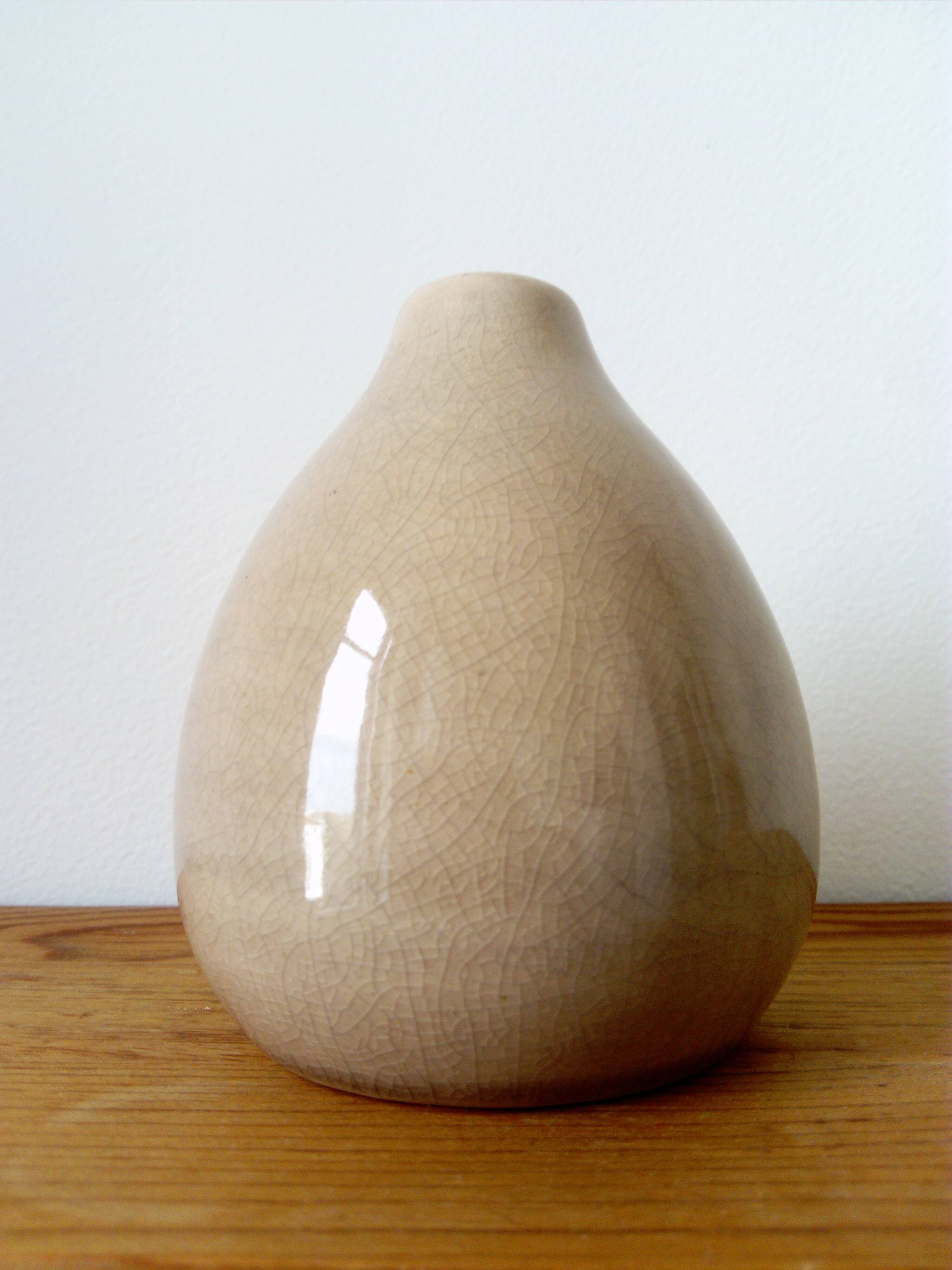 beige vase in finely cracked glazed ceramic