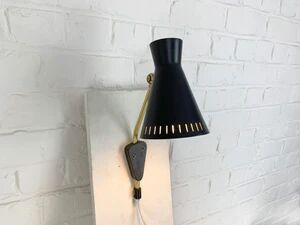 Scandinavian Diabolo wall light model 215 by EAE, Sweden, 1950s.