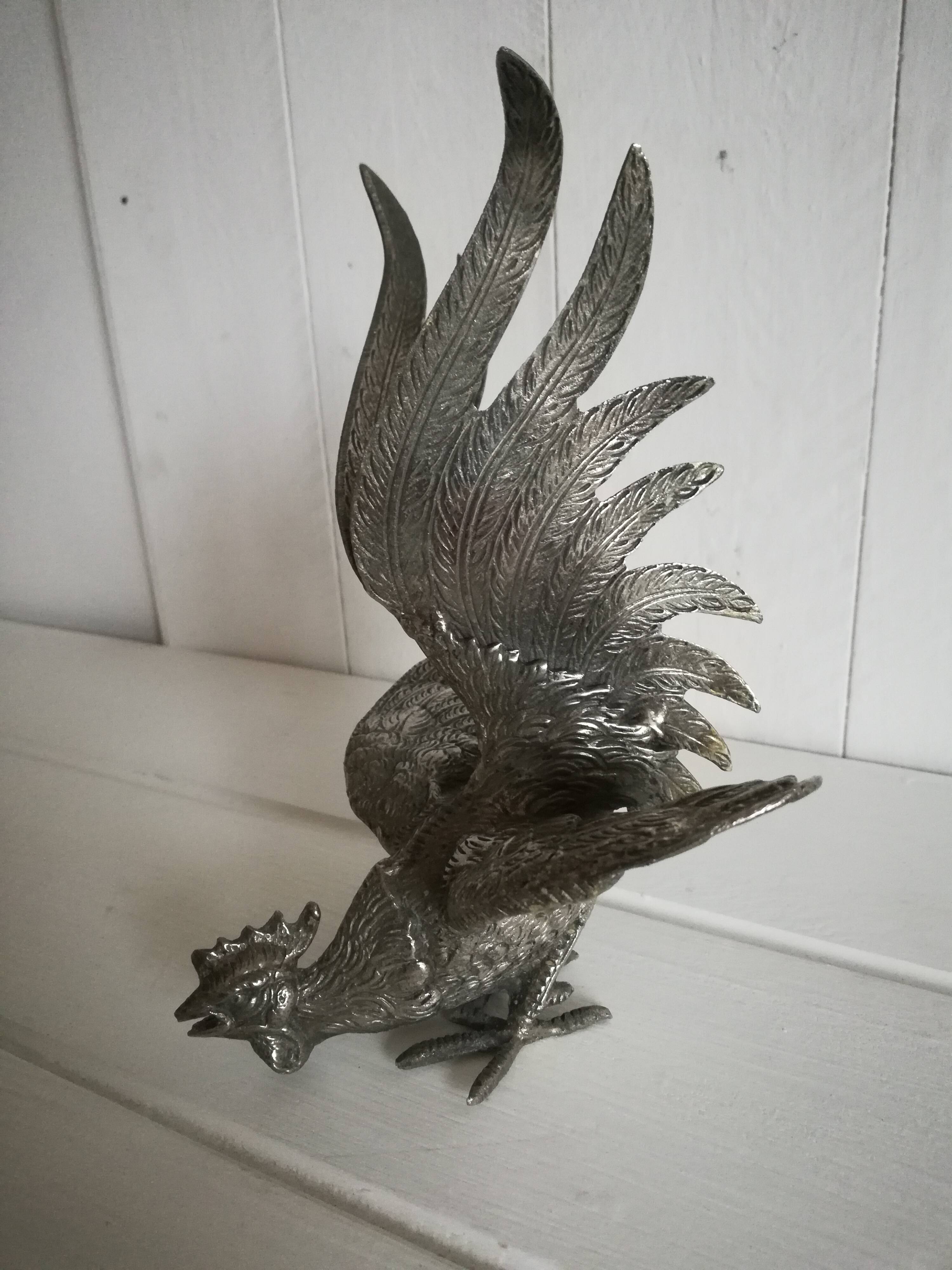 Silver metal rooster / Greenhouse book
