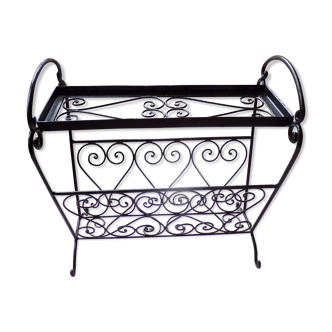 Magazine holder and wrought iron plant