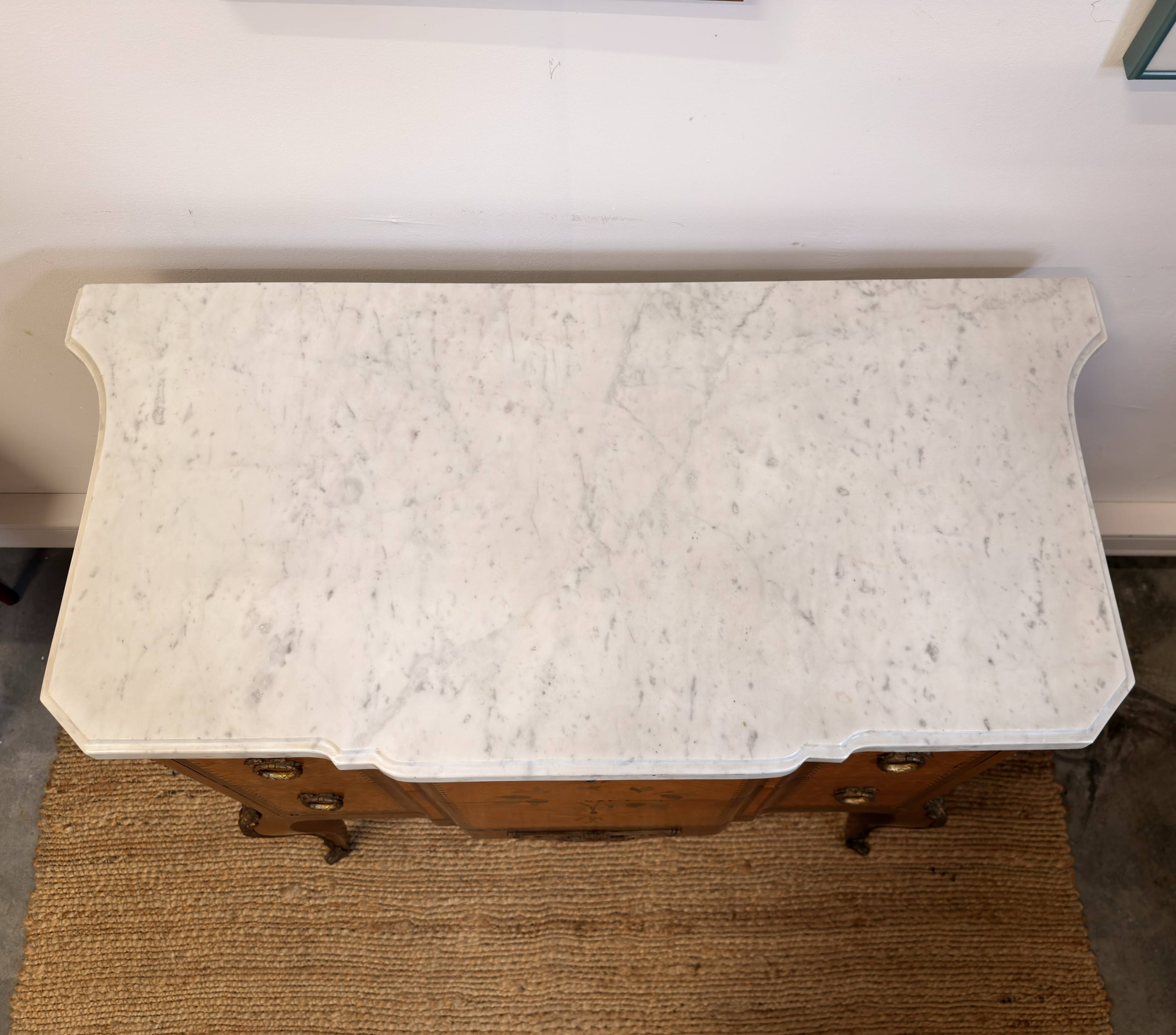 Commode Transition stamped by François Daidé, with a white marble top.