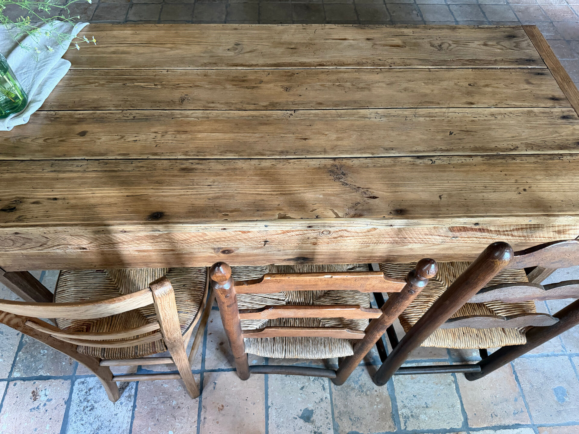 Renovated raw wood farmhouse table