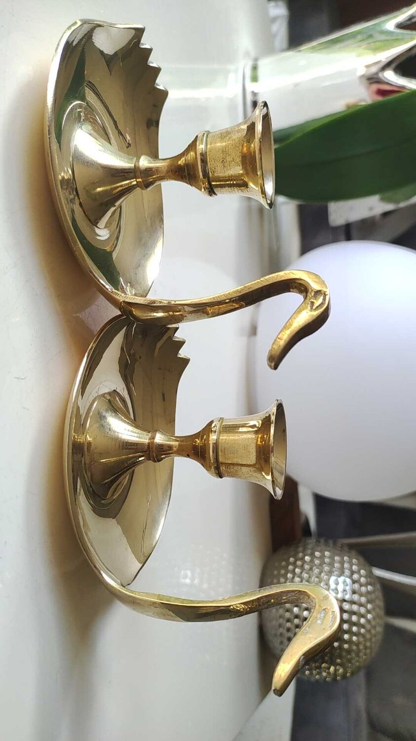 Pair of hand candle holders/Cellar rats shape swans, in polished brass. 1950s
