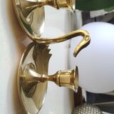 Pair of hand candle holders/Cellar rats shape swans, in polished brass. 1950s