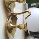 Pair of hand candle holders/Cellar rats shape swans, in polished brass. 1950s