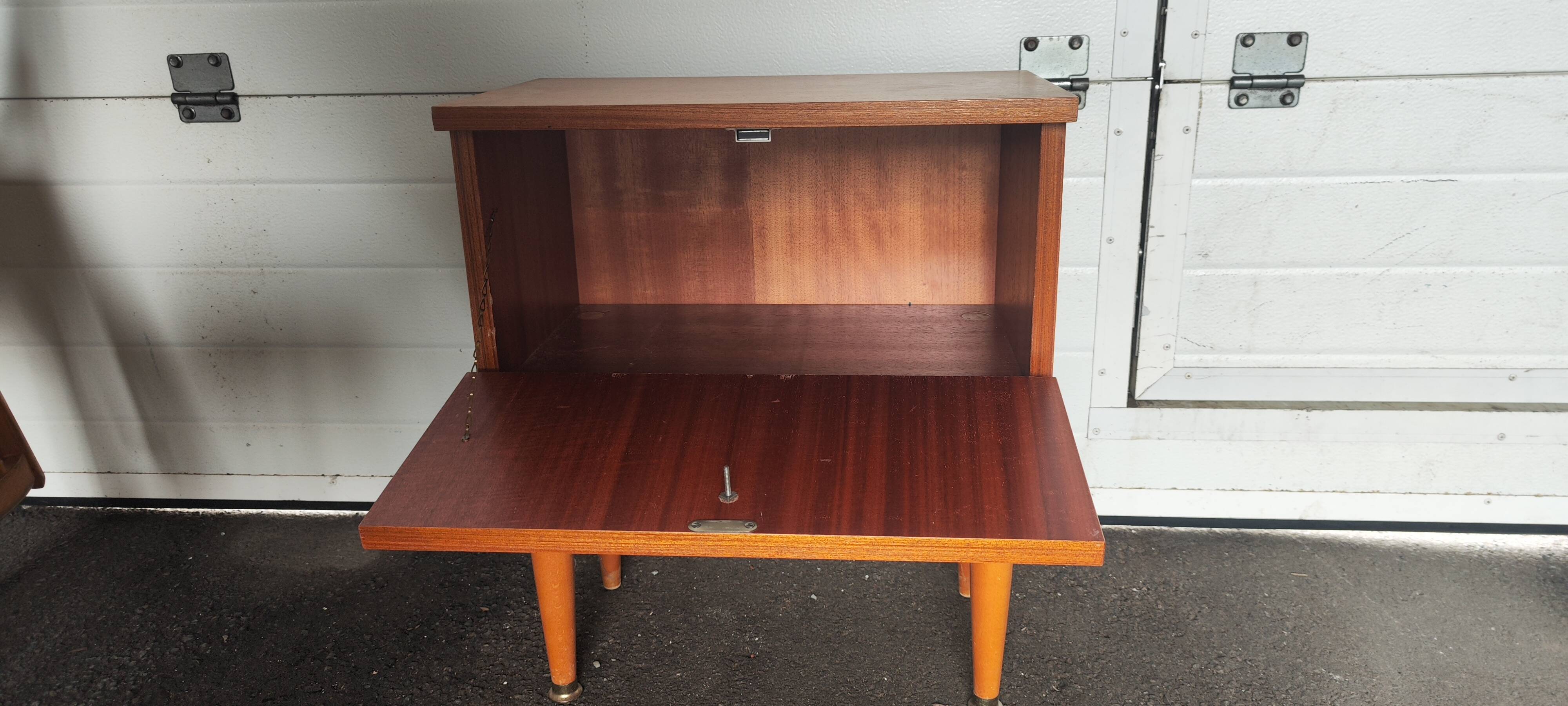 Vintage bedside table from the 70s scandinavian with a flap