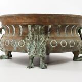 Repelled copper planter with acanthus and cast bronze legs, 1900s