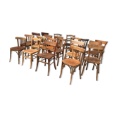 Set of 15 mismatched curved wood bistro chairs