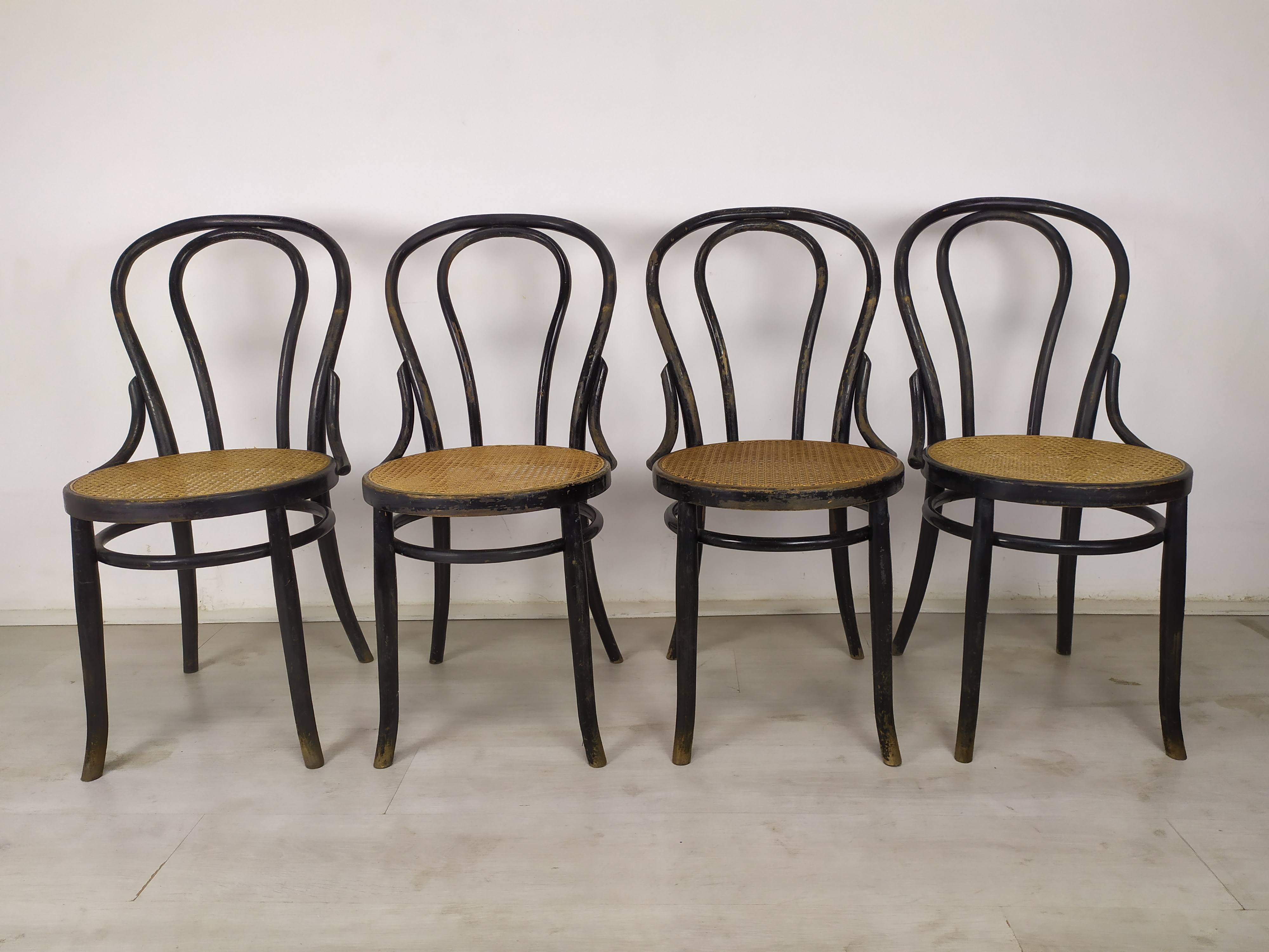 Black canned bistro chairs
