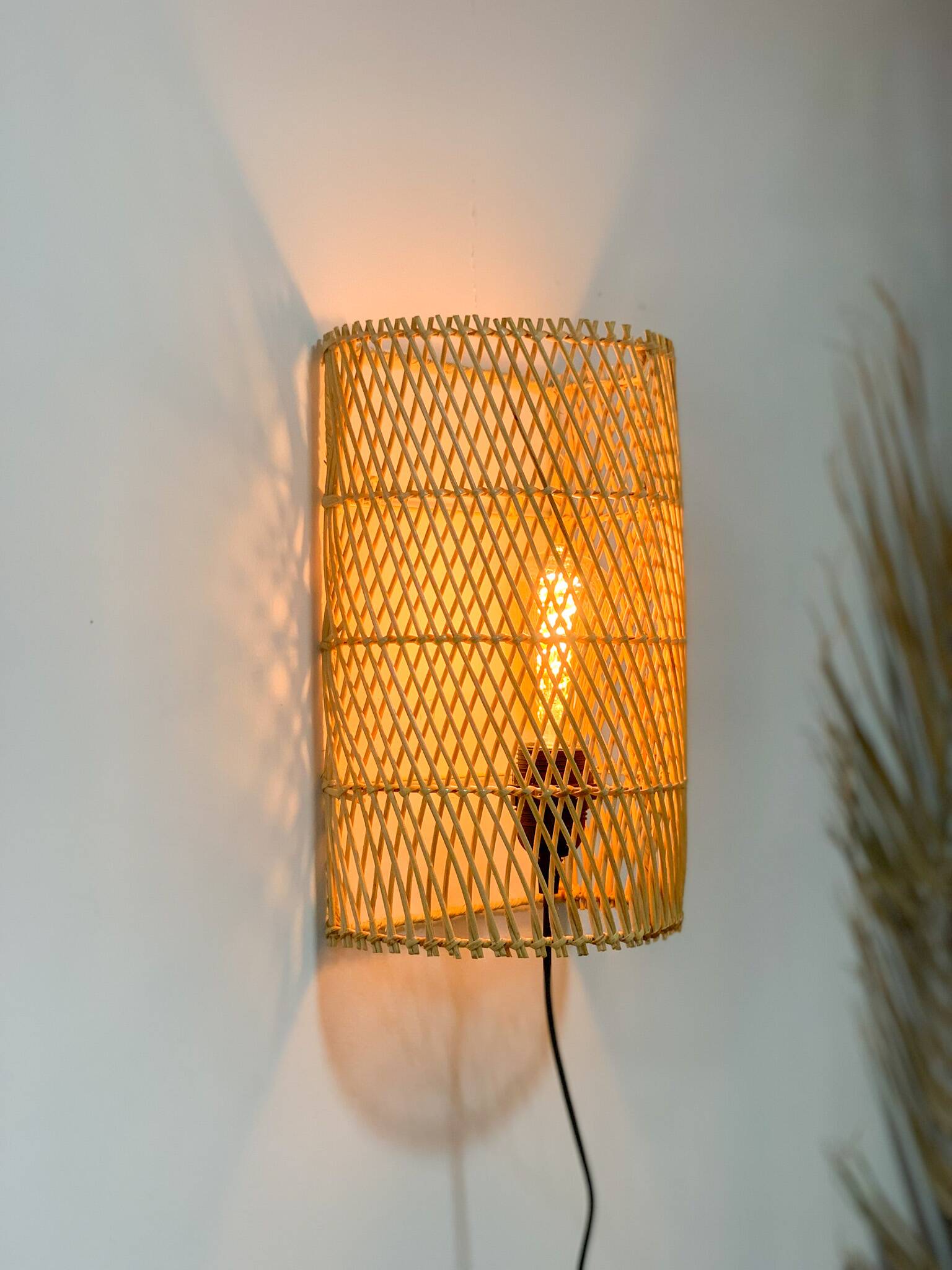 Natural rattan wall light
