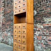 Large vintage workshop furniture with 30 drawers, antique haberdashery compartments.