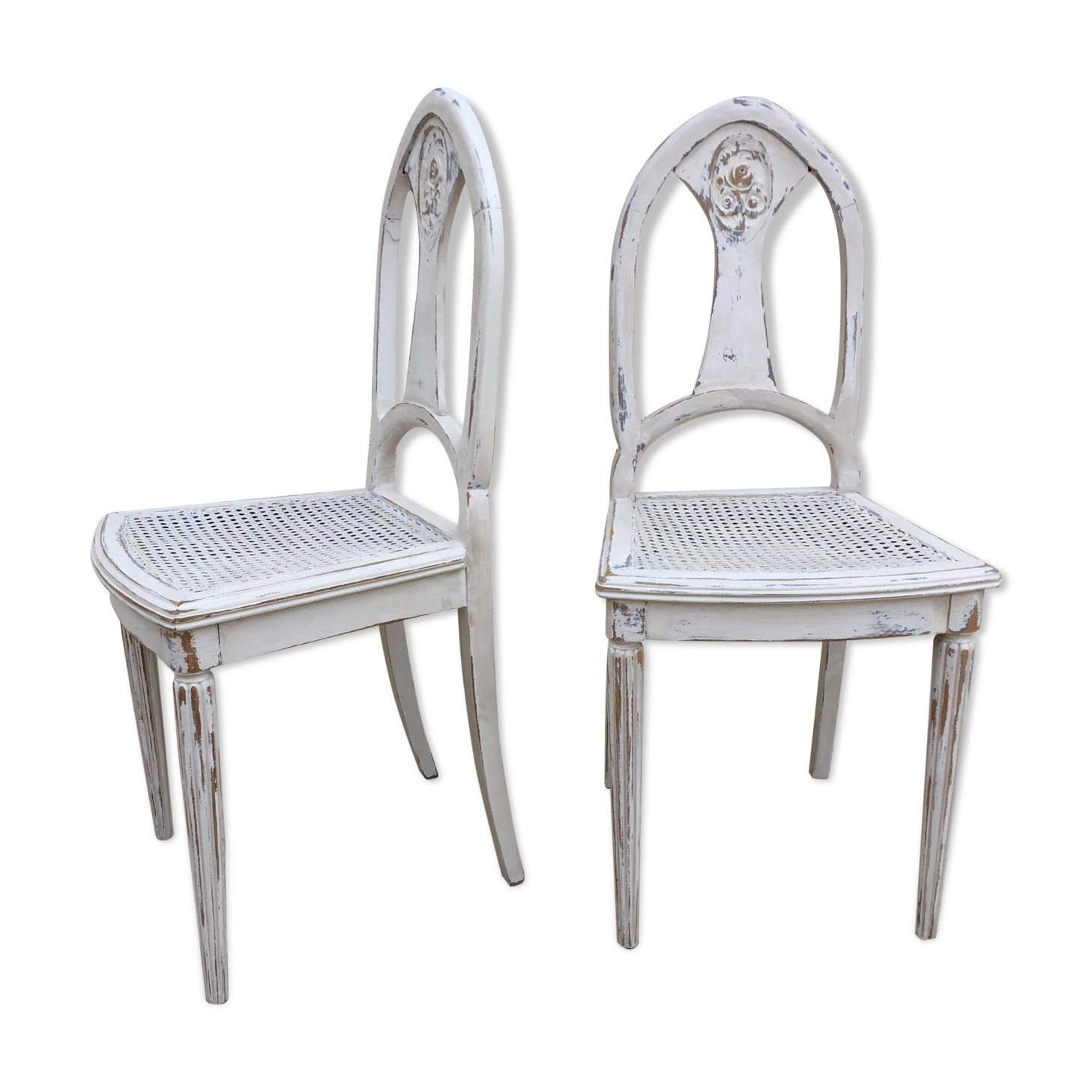 Pair of old white canne chairs