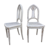 Pair of old white canne chairs