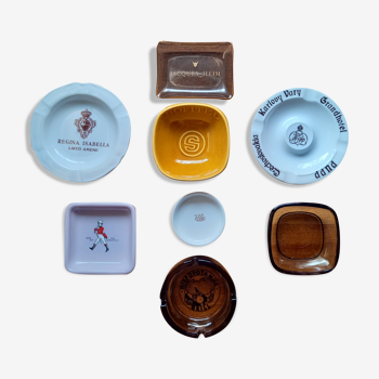 Set of 8 advertising ashtrays