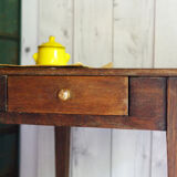 Old rustic wooden farmhouse table in 50s