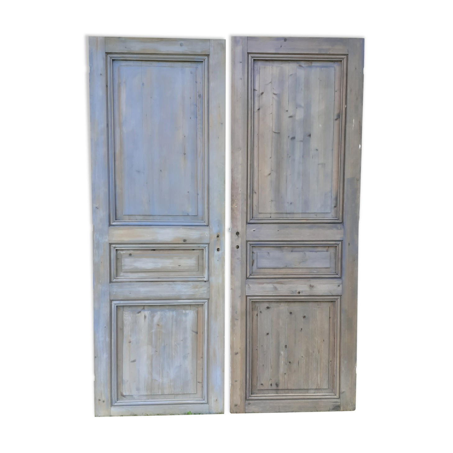 Pairs of Haussmannian doors in patinated aged wood