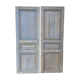 Pairs of Haussmannian doors in patinated aged wood