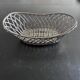 Silver woven metal basket