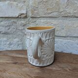 Old terracotta mug with glazed interior